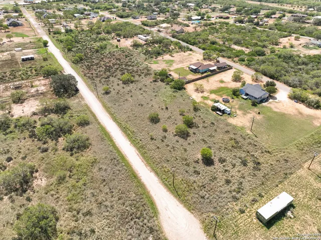 a view of a yard with street