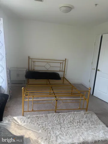 a room with chairs and window