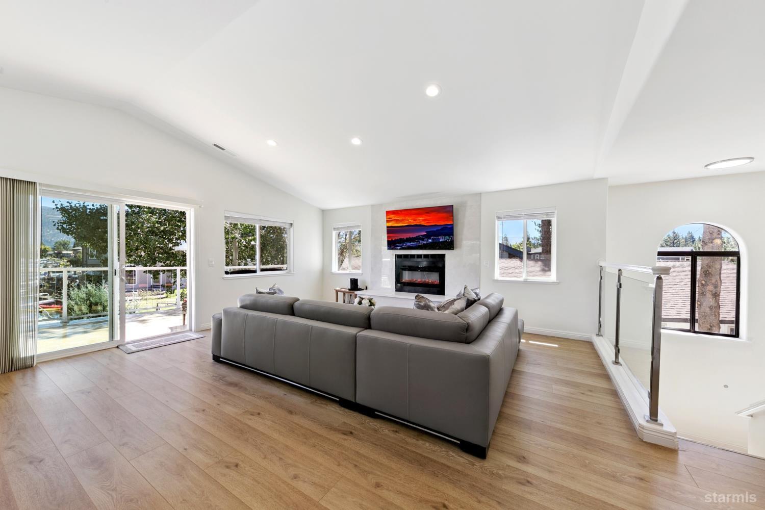 487 Christie Drive South Lake Tahoe, CA 96150 - Photo 12 of 40 a living room with furniture and a flat screen tv