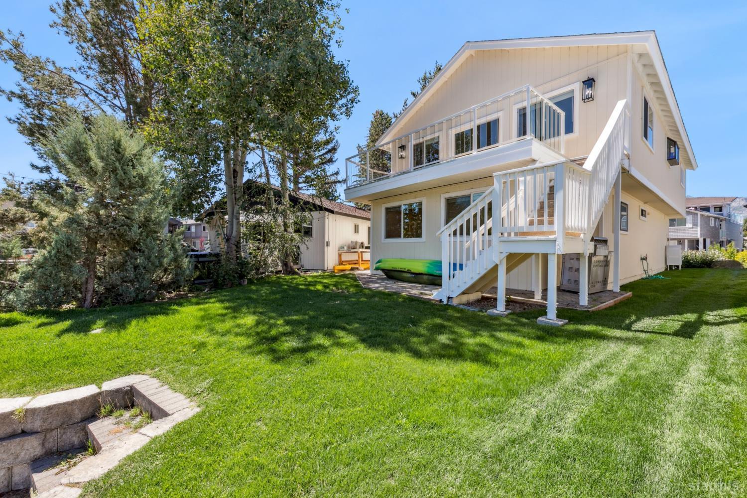 487 Christie Drive South Lake Tahoe, CA 96150 - Photo 18 of 40 a view of house with yard and green space