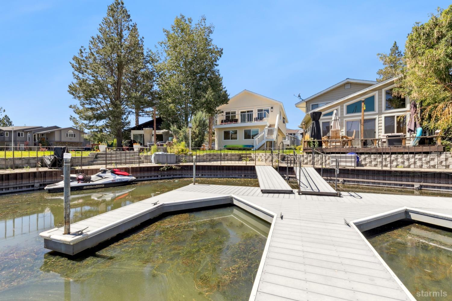 487 Christie Drive South Lake Tahoe, CA 96150 - Photo 22 of 40 a view of a swimming pool with a lounge chairs