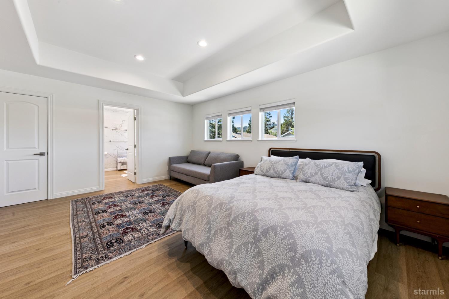 487 Christie Drive South Lake Tahoe, CA 96150 - Photo 32 of 40 a bed room with two beds and a night stand