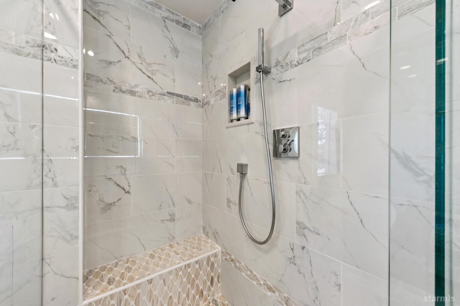 487 Christie Drive South Lake Tahoe, CA 96150 - Photo 35 of 40 a bathroom with a shower