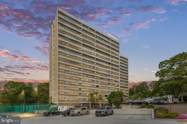 a front view of a building with street view