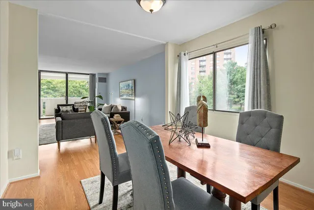 a kitchen with stainless steel appliances granite countertop wooden cabinets a sink and dishwasher