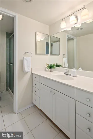 a view of balcony with wooden floor and fence