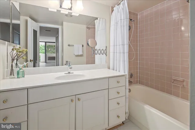 a view of a swimming pool with a lounge chairs