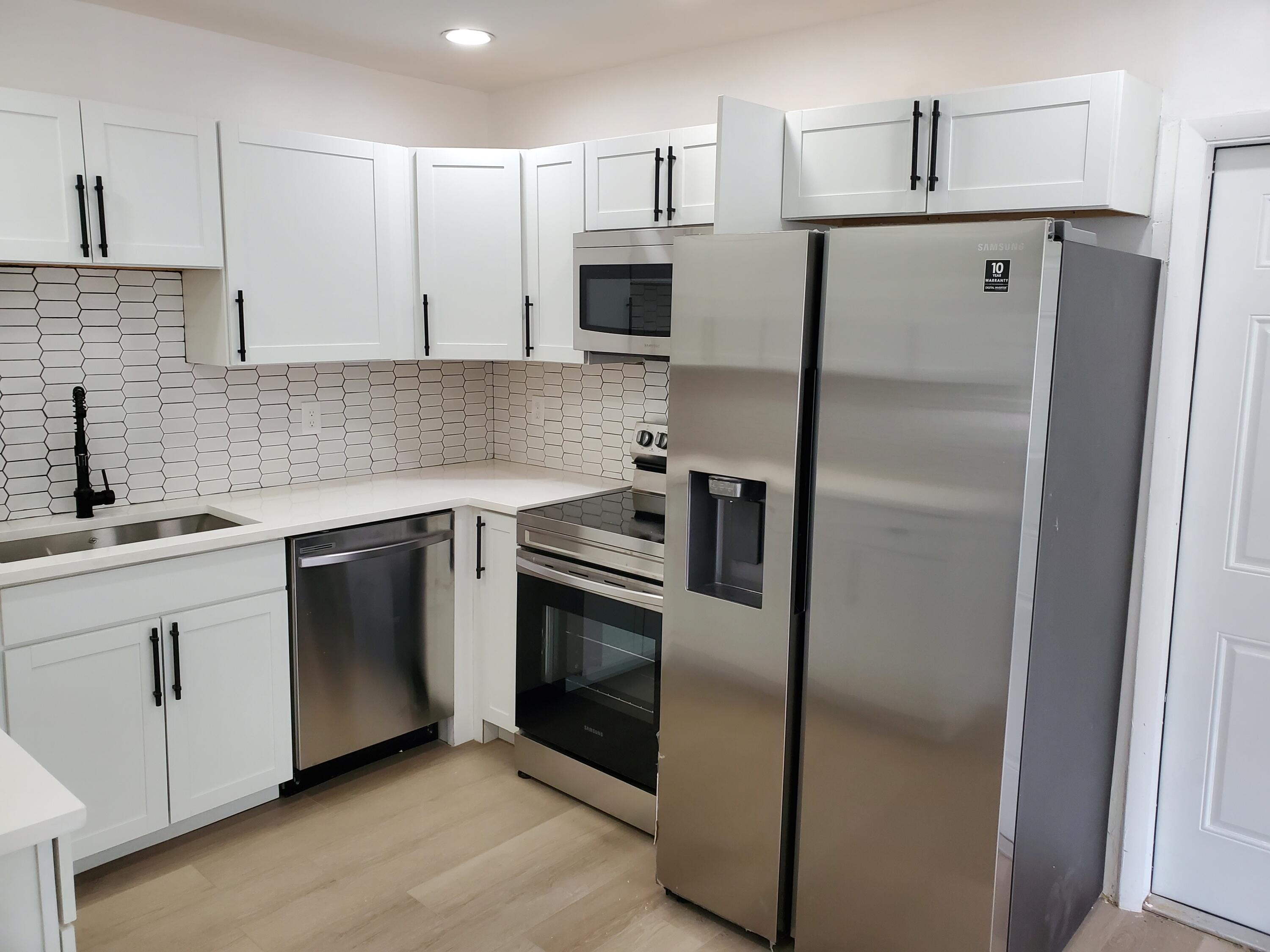 181 West 34th Street Riviera Beach, FL 33404 - Photo 9 of 23 20210622_142345