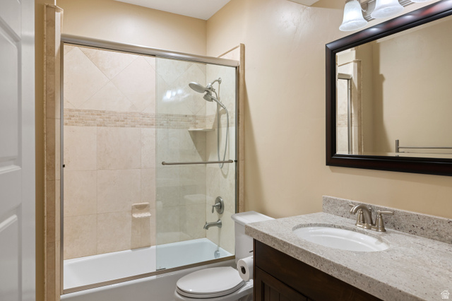 1263 Chapman Court Alpine, UT 84004 - Photo 53 of 83 Bathroom with vanity and bath / shower combo with glass door