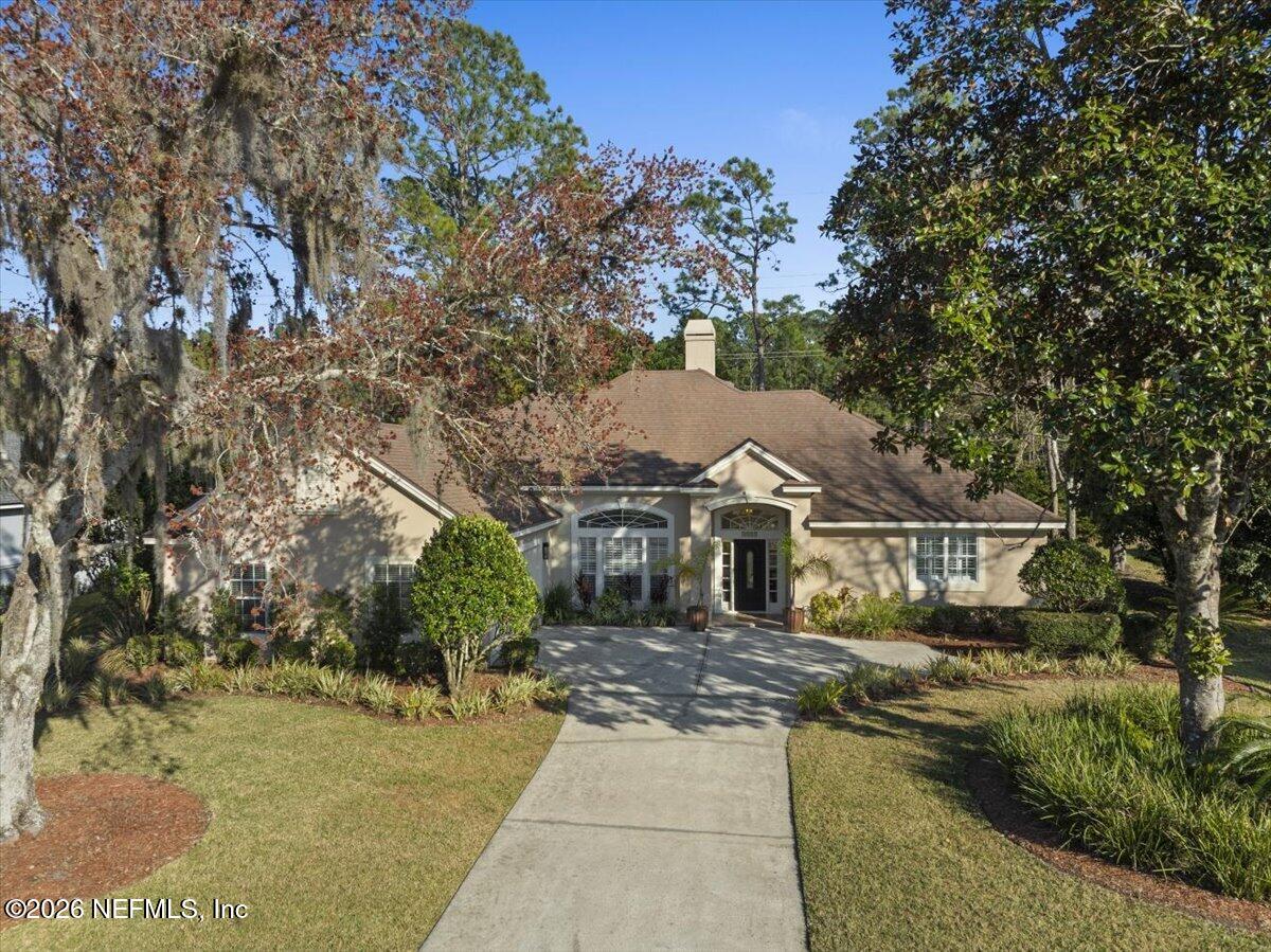 9957 Chelsea Lake Road Jacksonville, FL 32256 - Photo 5 of 75 Beautiful Landscaped front exterior