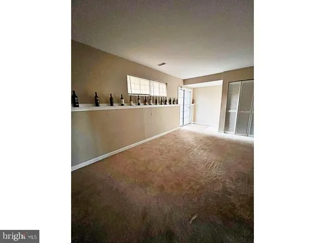 a workspace room with a window