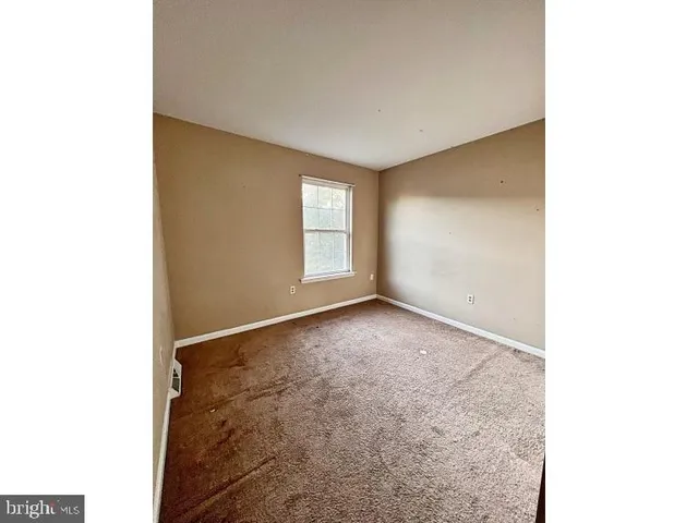 a view of empty room with window