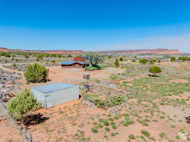 6178 East Zion Road Kanab, UT 84741 - Photo 44 of 48 Aerial view of sparsely populated area featuring a desert landscape and mountains