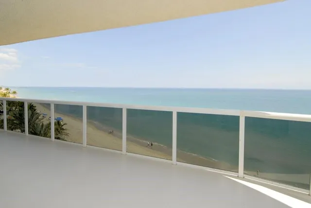 an empty room with closet and utility room