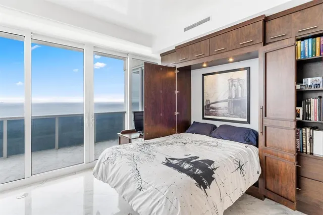 a view of a livingroom with furniture and window