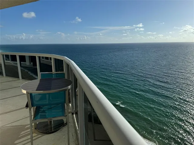 a view of ocean from a balcony
