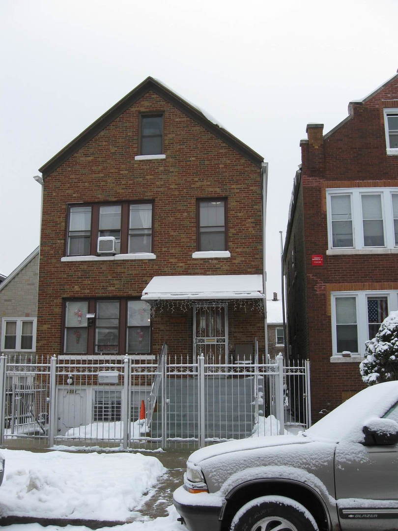 2553 West 45th Street Chicago, IL 60632 - Photo 1 of 15 a view of a car parked in front of a building