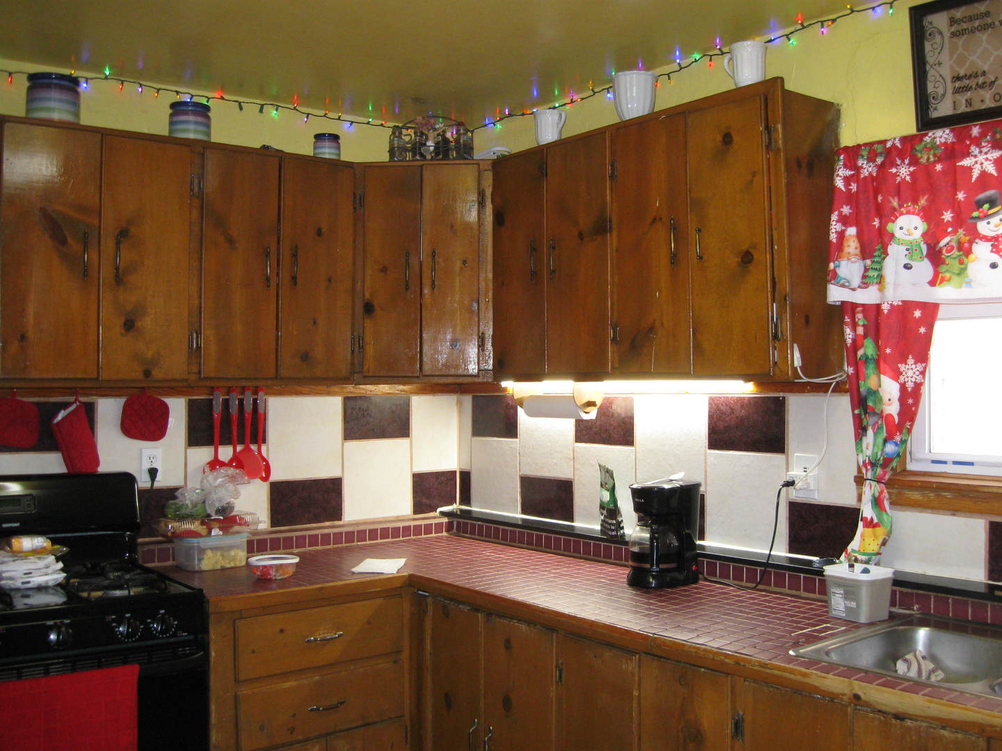 2553 West 45th Street Chicago, IL 60632 - Photo 4 of 15 a kitchen with granite countertop a sink cabinets and appliances