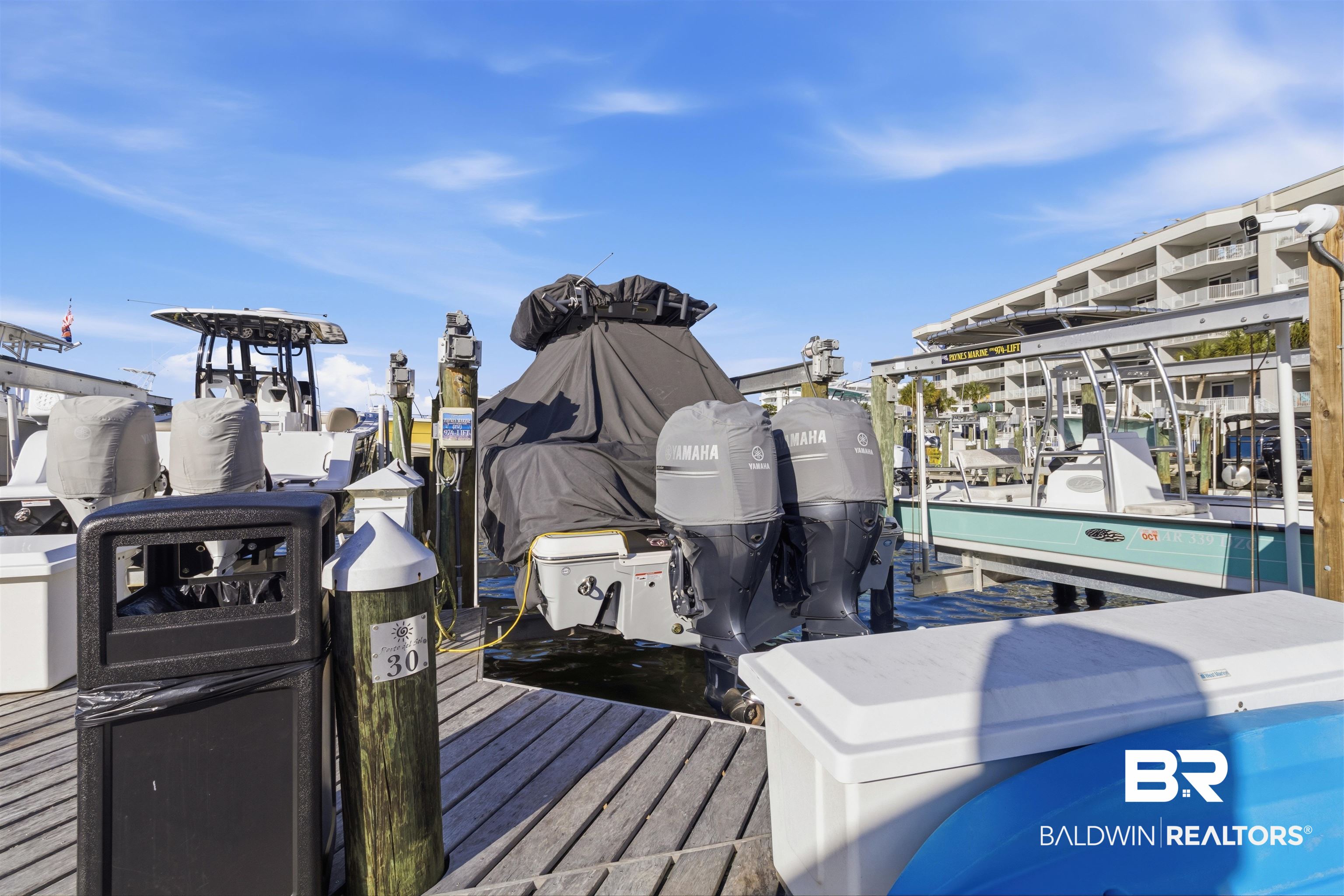 3564 Bayou Road, Unit 203 Orange Beach, AL 36561 - Photo 43 of 53 Waterfront boat slip with a wooden dock