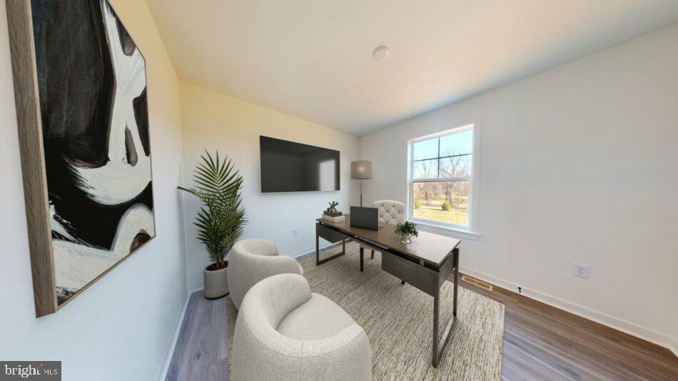 0 Old Orch Road, Unit DANBURY Strasburg, PA 17579 - Photo 14 of 21 a living room with furniture and a flat screen tv