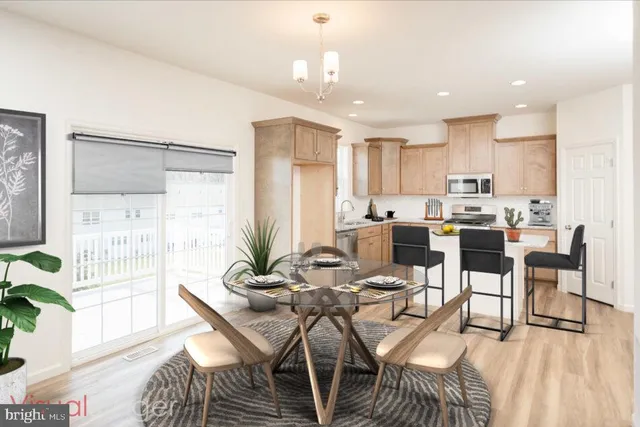 a view of a dining room with furniture window and outside view