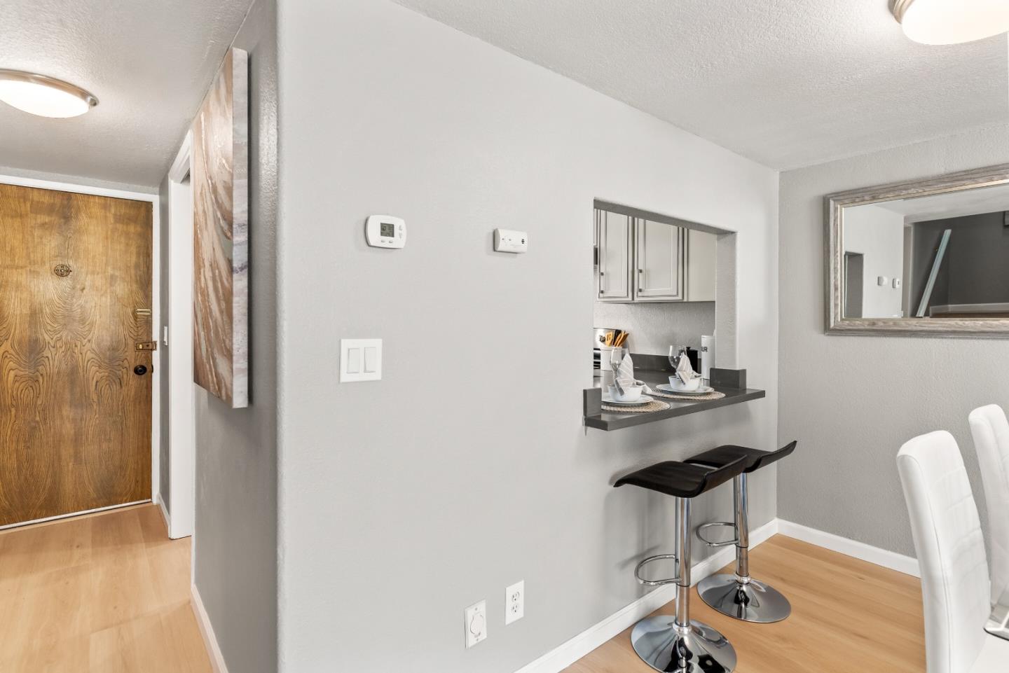1264 Riesling Terrace Sunnyvale, CA 94087 - Photo 12 of 30 a view of a workspace with furniture and wooden floor