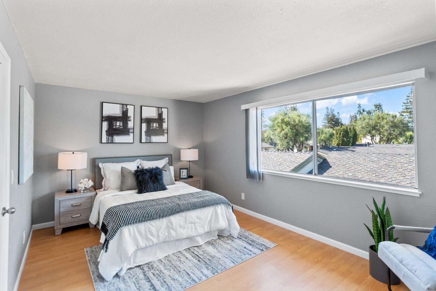 1264 Riesling Terrace Sunnyvale, CA 94087 - Photo 20 of 30 a bedroom with a bed and a window