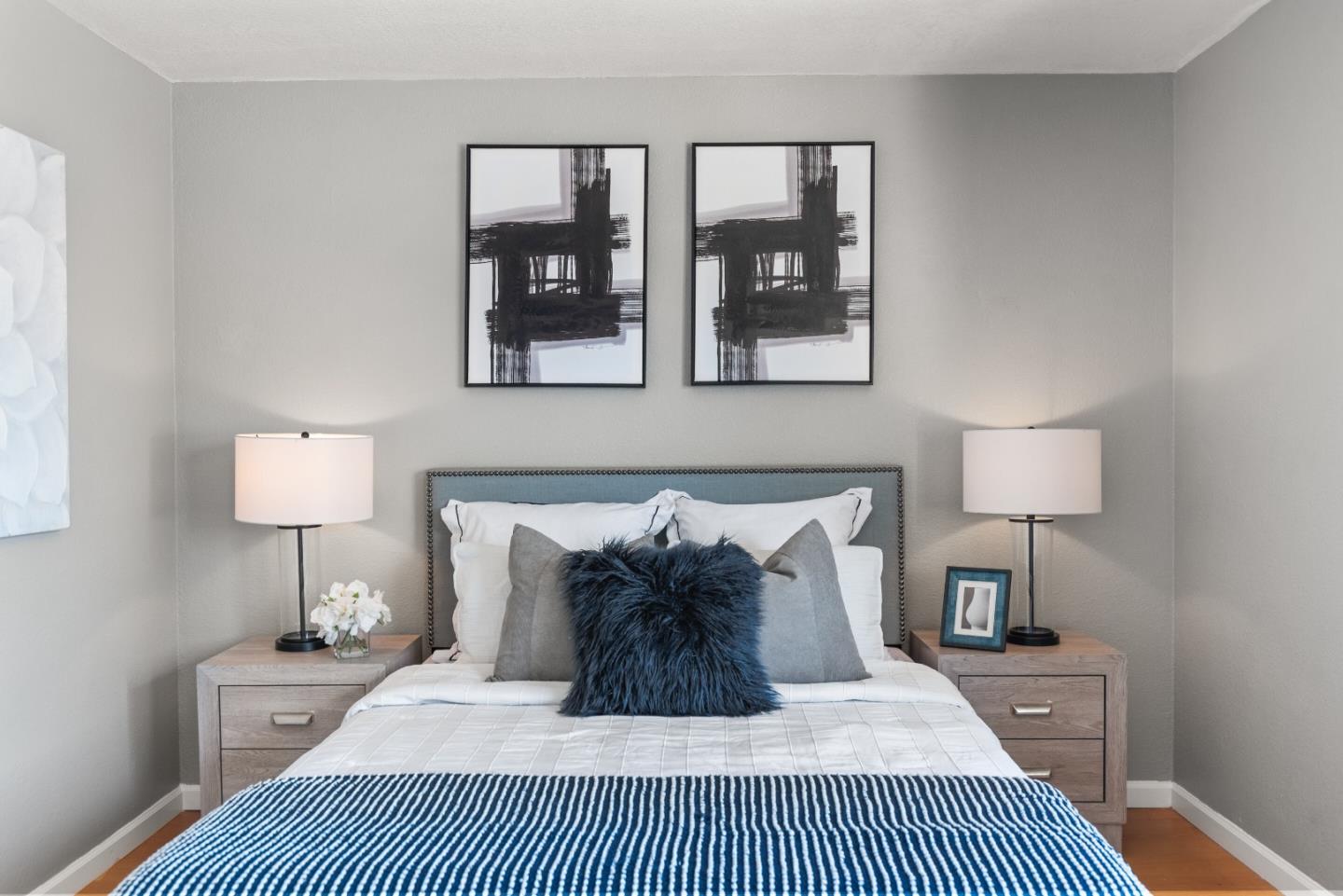 1264 Riesling Terrace Sunnyvale, CA 94087 - Photo 21 of 30 a large bed sitting in a bedroom next to a lamp