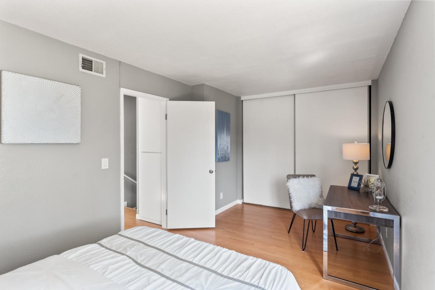 1264 Riesling Terrace Sunnyvale, CA 94087 - Photo 25 of 30 a bedroom with a bed and a table in it