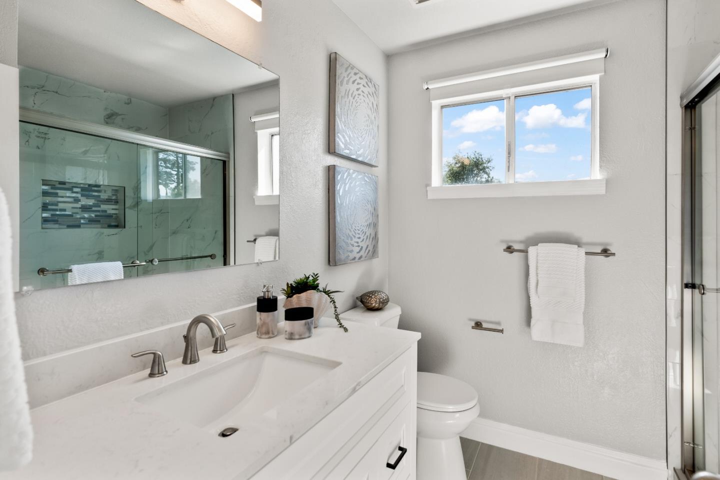 1264 Riesling Terrace Sunnyvale, CA 94087 - Photo 26 of 30 a bathroom with a sink toilet and shower