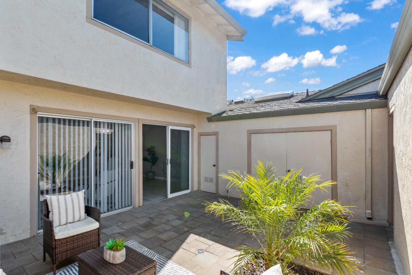 1264 Riesling Terrace Sunnyvale, CA 94087 - Photo 28 of 30 a view of a porch with chairs and potted plants
