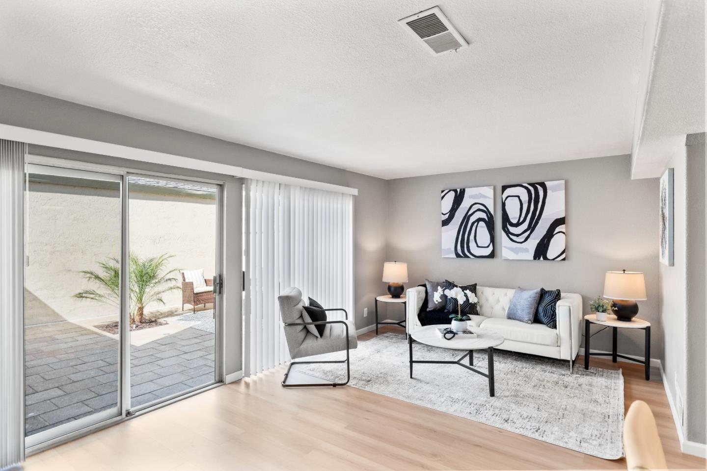 1264 Riesling Terrace Sunnyvale, CA 94087 - Photo 5 of 30 a living room with furniture and a potted plant