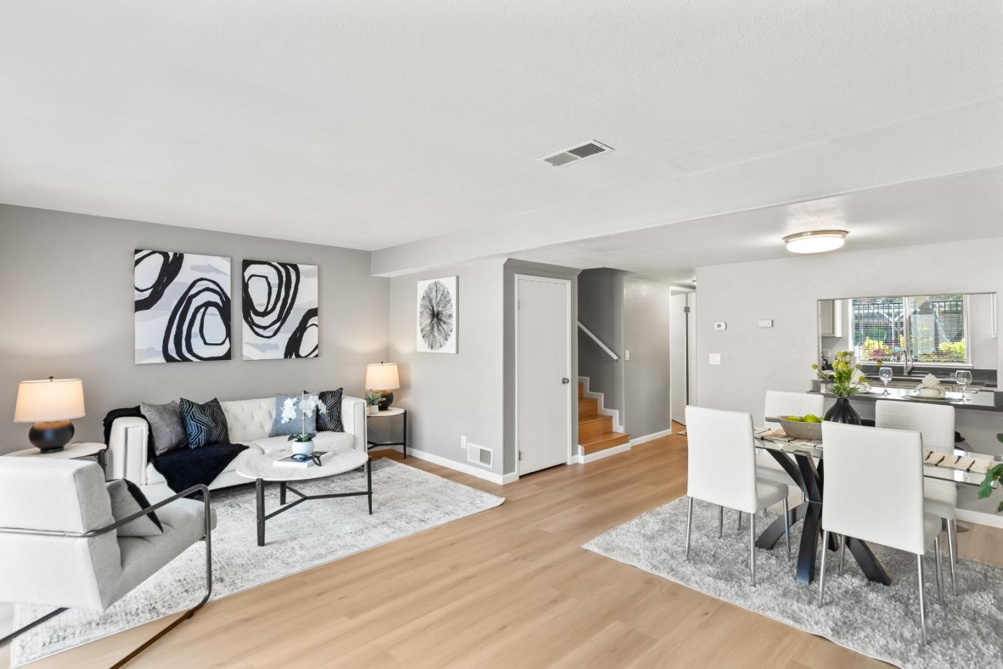1264 Riesling Terrace Sunnyvale, CA 94087 - Photo 6 of 30 a living room with furniture and a wooden floor