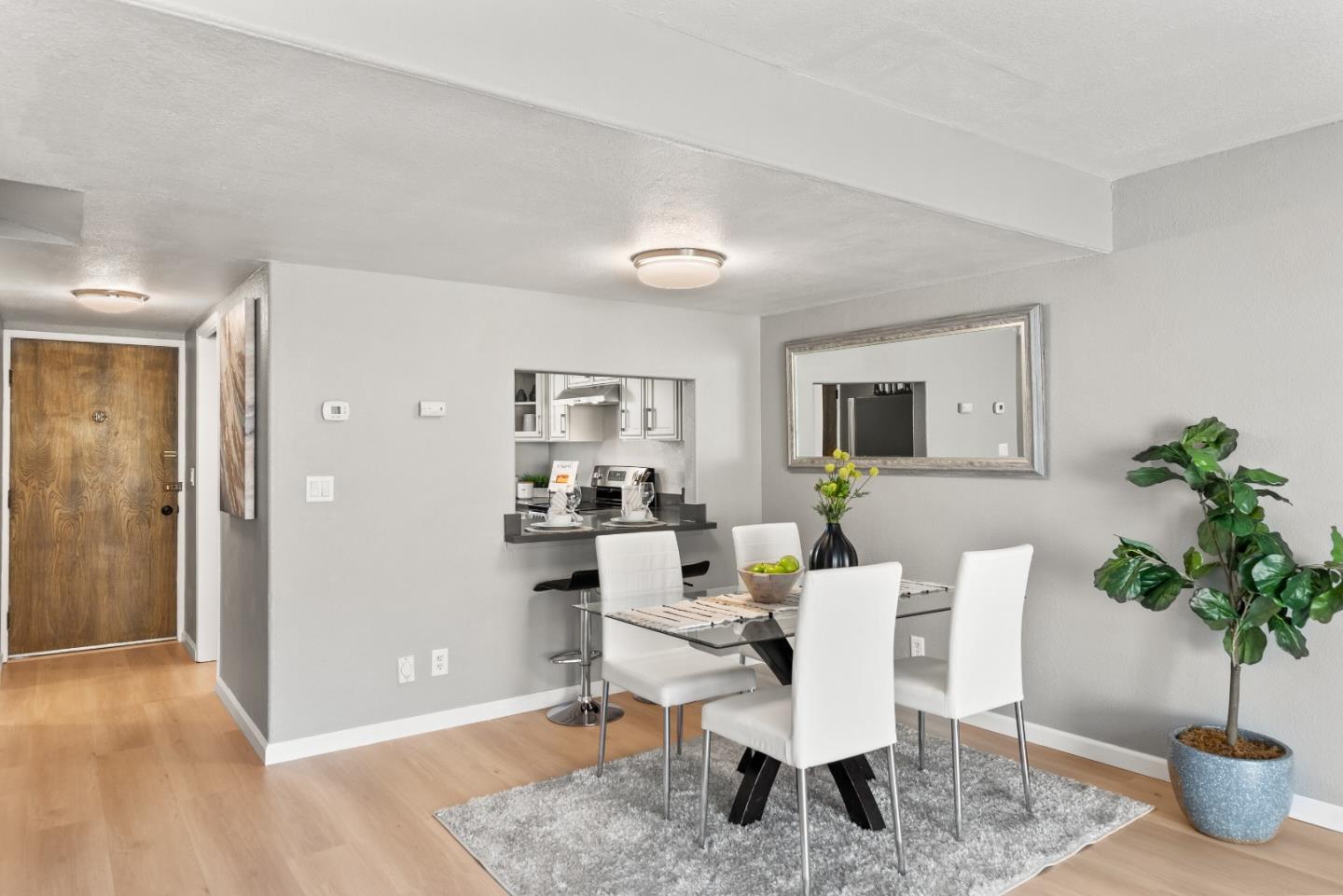 1264 Riesling Terrace Sunnyvale, CA 94087 - Photo 9 of 30 a view of a livingroom with furniture and a potted plant