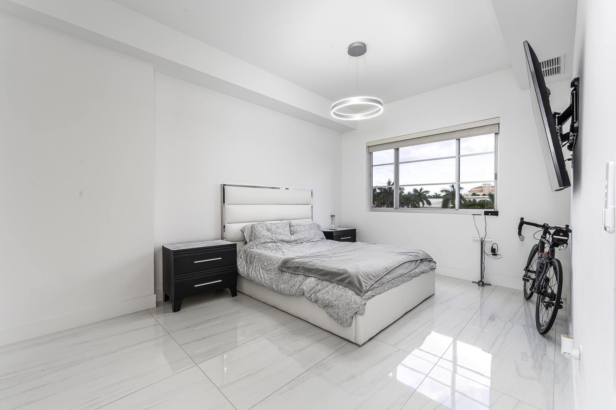 155 East Boca Raton Road, Unit 415 Boca Raton, FL 33432 - Photo 11 of 41 a bedroom with a bed and a window