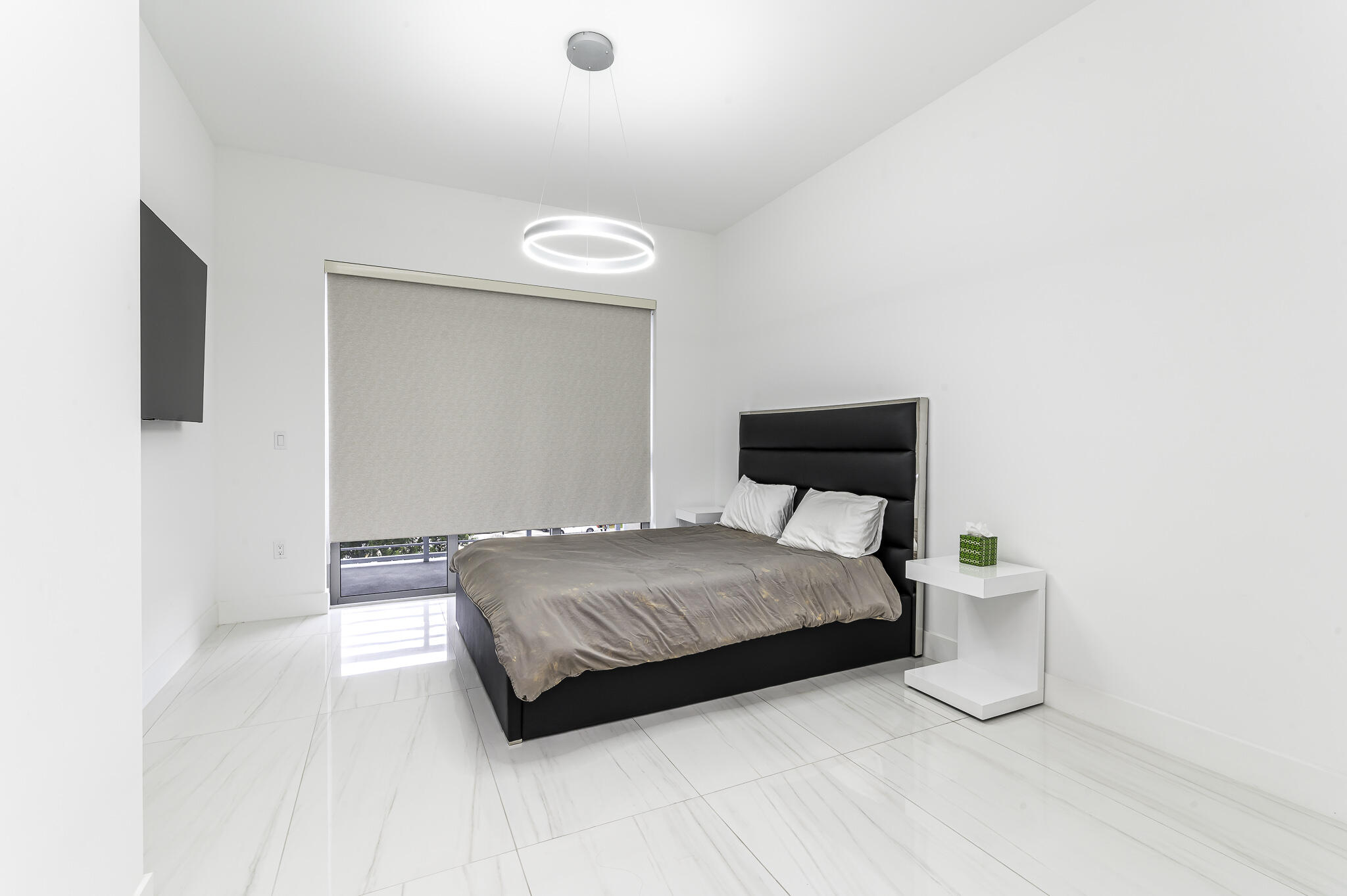 155 East Boca Raton Road, Unit 415 Boca Raton, FL 33432 - Photo 7 of 41 a bedroom with a bed and a mirror