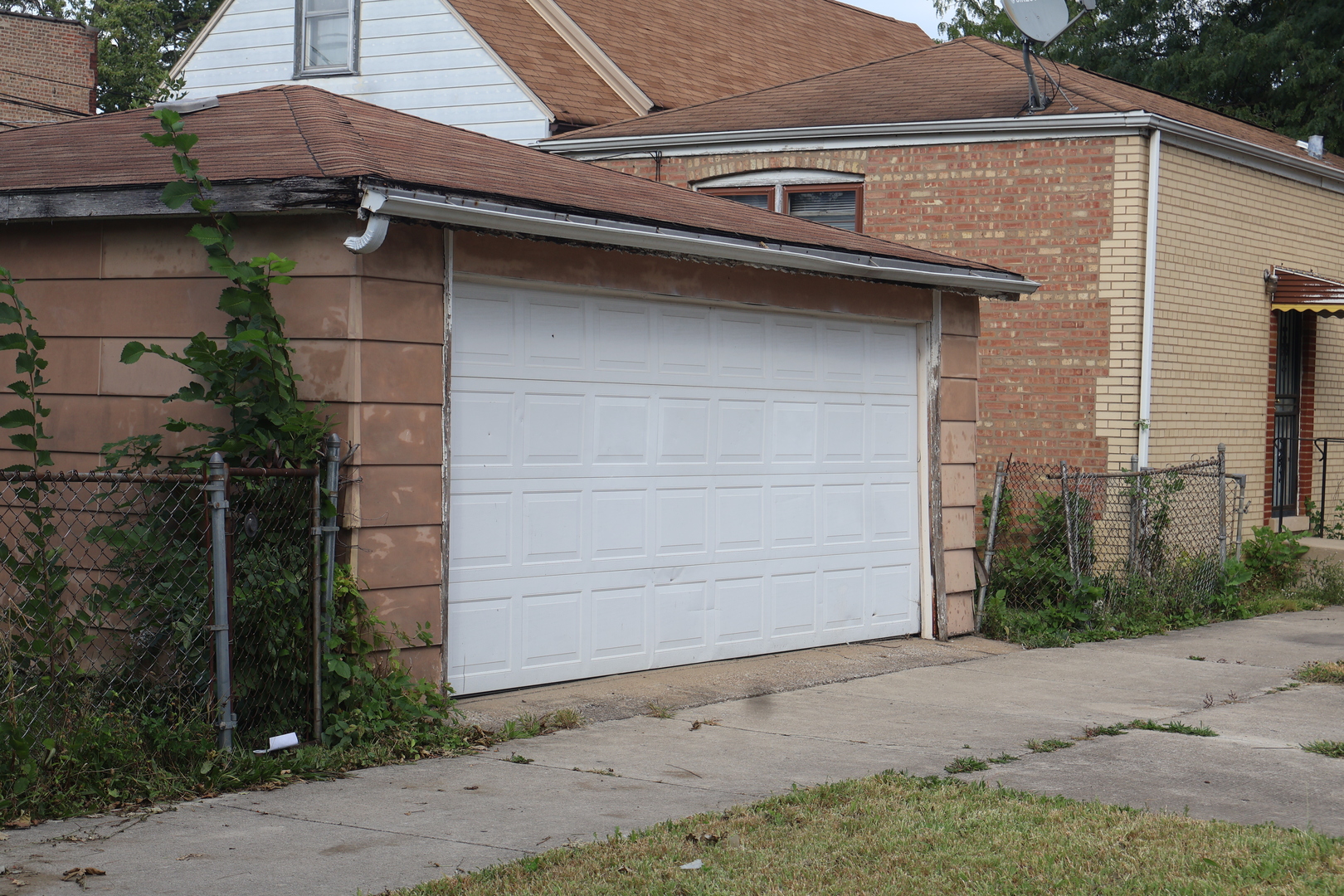 8558 South Sangamon Street Chicago, IL 60620 - Photo 4 of 4 a view of a house with a garage