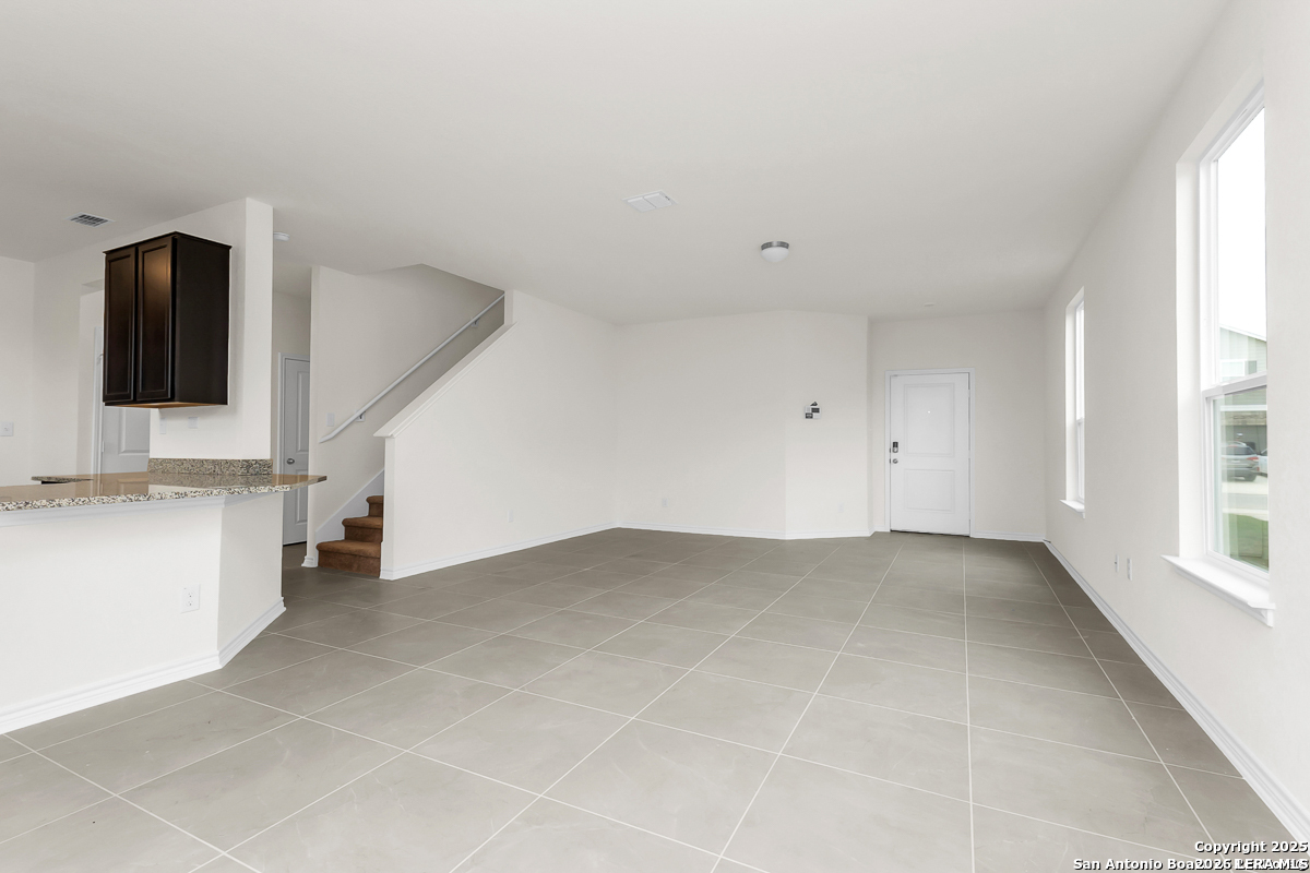 14458 Ribbon Tail Elmendorf, TX 78112 - Photo 7 of 22 a view of an empty room with a window