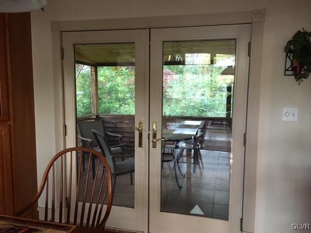 116 Rugosa Road Cresco, PA 18326 - Photo 9 of 19 a dining room with furniture and a floor to ceiling window