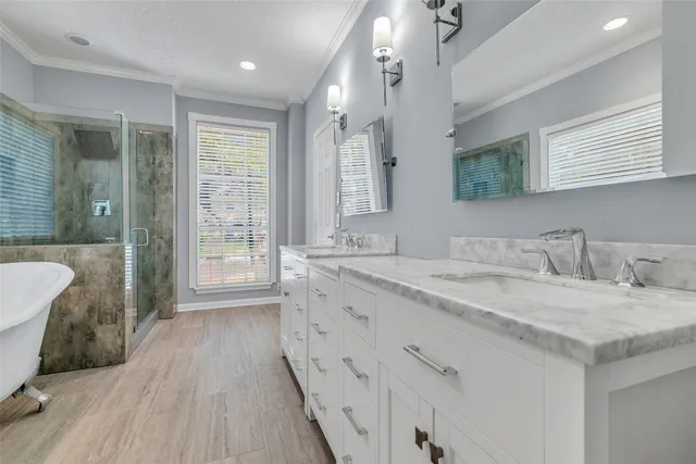 a room with furniture pool table and windows