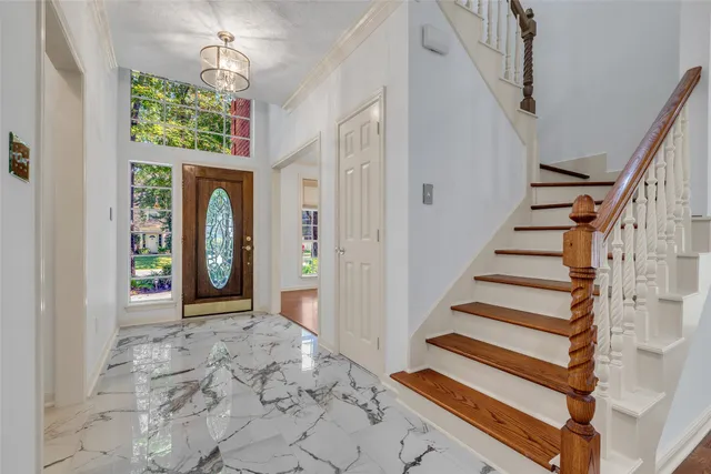 a view of entryway with a front door