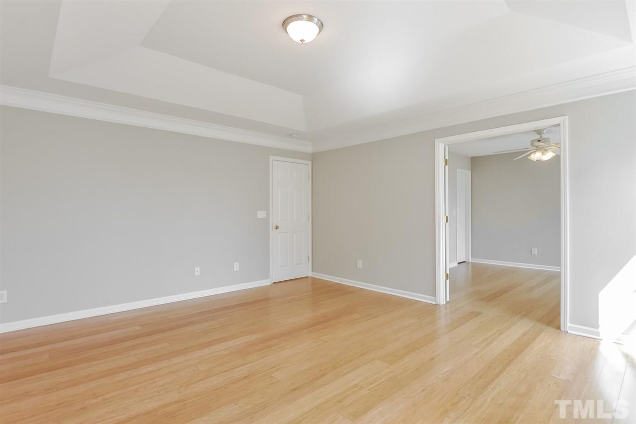 5100 Marathon Lane Raleigh, NC 27616 - Photo 12 of 24 wooden floor in an empty room
