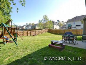 30 Woodfern Road Fletcher, NC 28732 - Photo 17 of 19 a view of a house with swimming pool and a yard