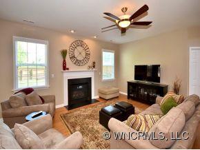30 Woodfern Road Fletcher, NC 28732 - Photo 3 of 19 a living room with furniture or couch and a fireplace