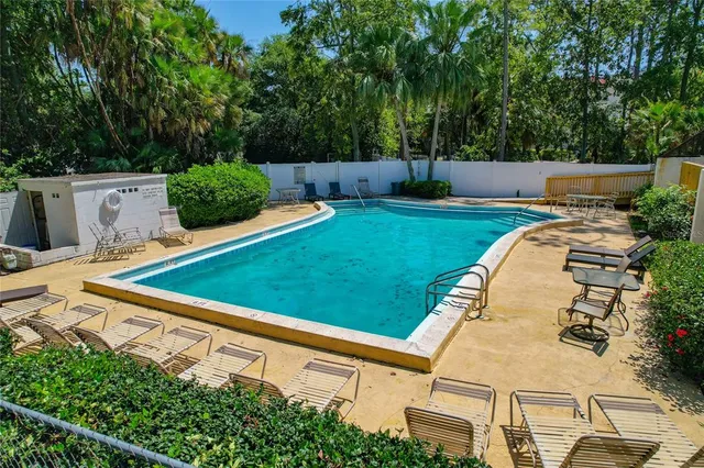 a view of a house with swimming pool