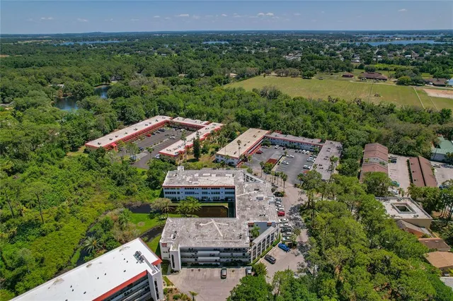 an aerial view of a house with a garden