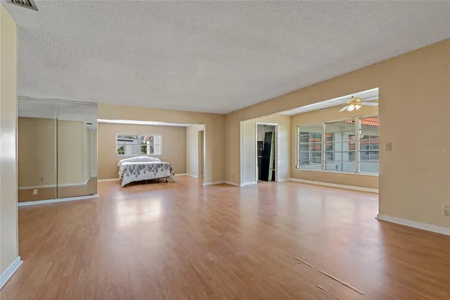 a view of a livingroom with wooden floor