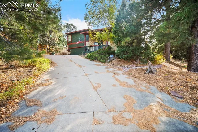 a view of a house with a street
