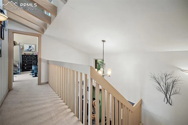 a view of a hallway view with staircase