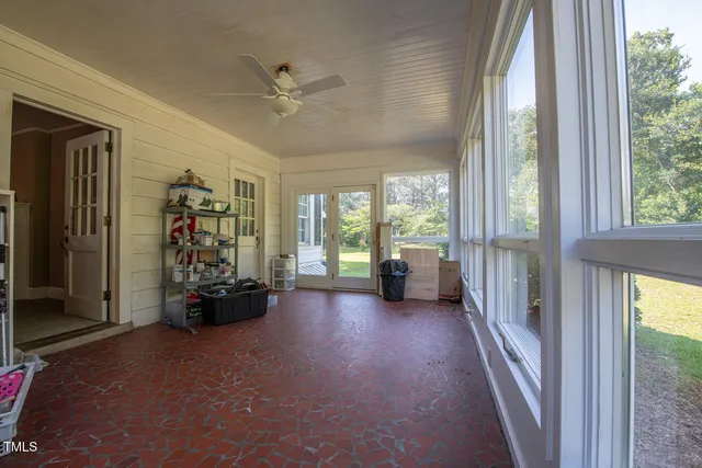 a view of livingroom with furniture and a window